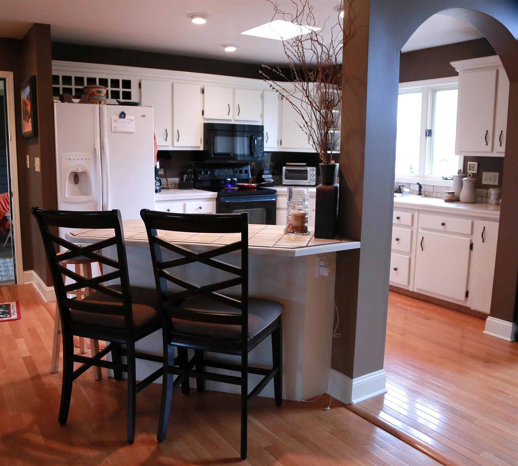 2004 Lawrence Lane Springfield, TN 37172 - Photo 5 of 30 a kitchen with stainless steel appliances a microwave a stove a table and chairs