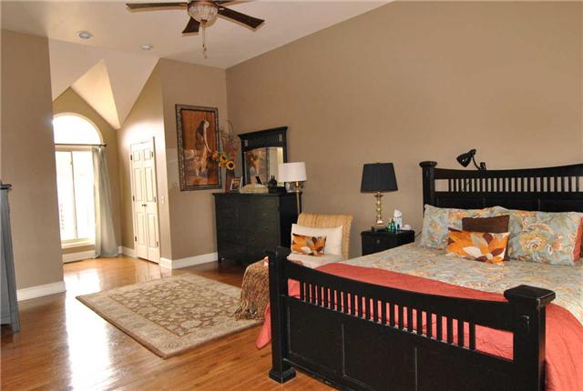 2004 Lawrence Lane Springfield, TN 37172 - Photo 8 of 30 a bedroom with bed and wooden floor