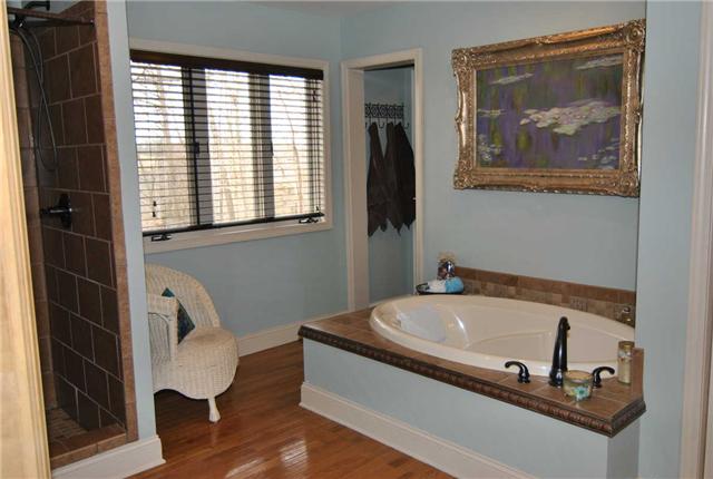 2004 Lawrence Lane Springfield, TN 37172 - Photo 10 of 30 a bathroom with a tub and a window