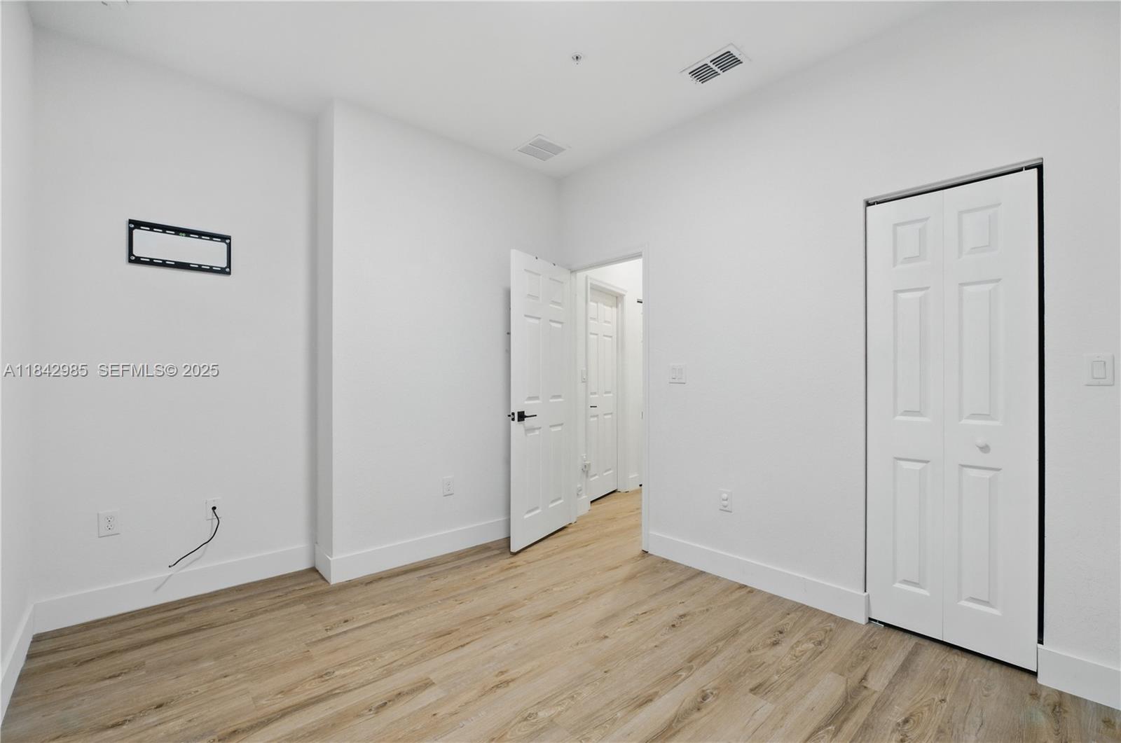 2851 Prospect Road, Unit 307 Tamarac, FL 33309 - Photo 17 of 21 a view of an empty room