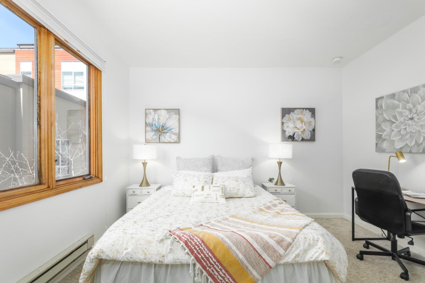 2029 Channing Way, Unit 3C Berkeley, CA 94704 - Photo 12 of 31 a bedroom with a bed and a window