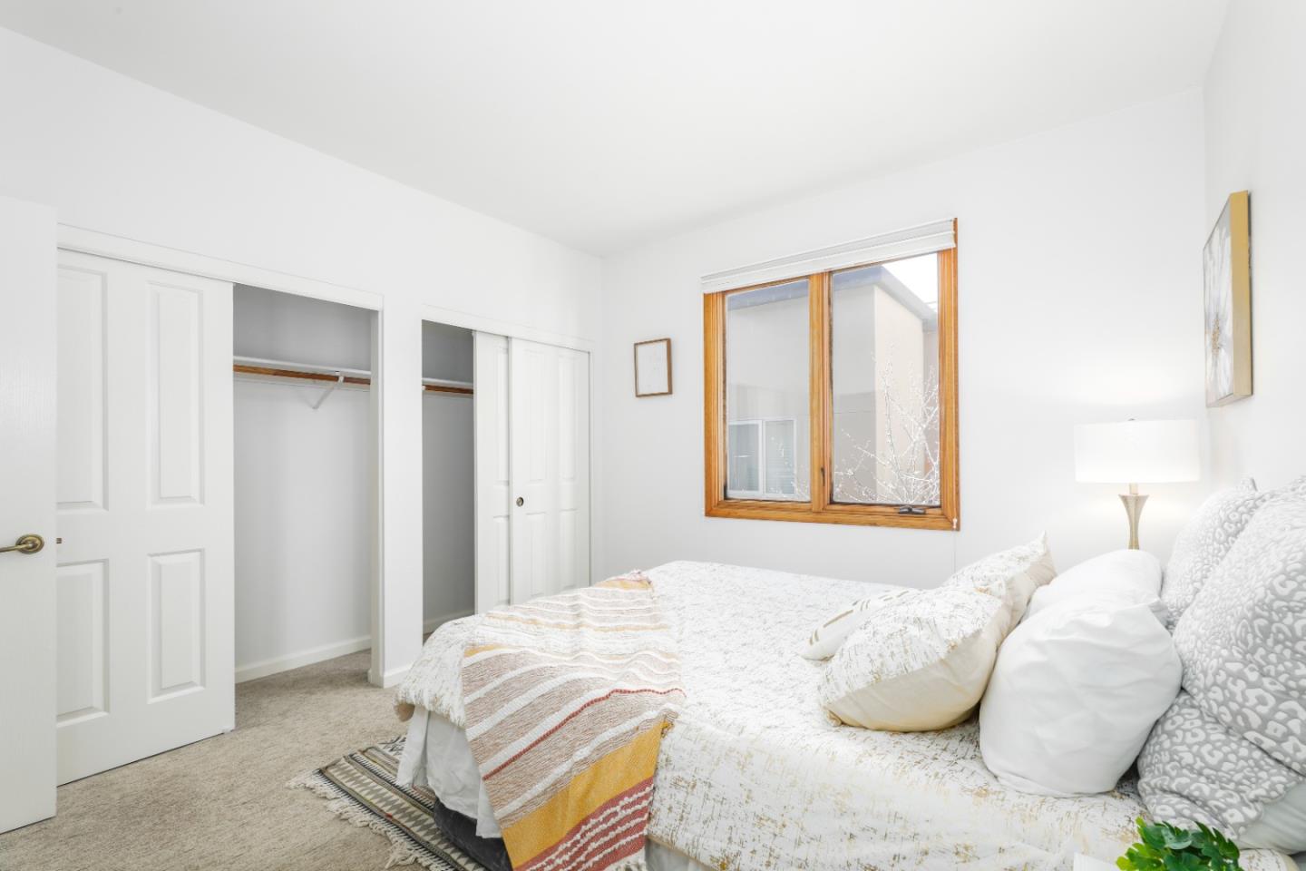 2029 Channing Way, Unit 3C Berkeley, CA 94704 - Photo 14 of 31 a bedroom with a bed and a window