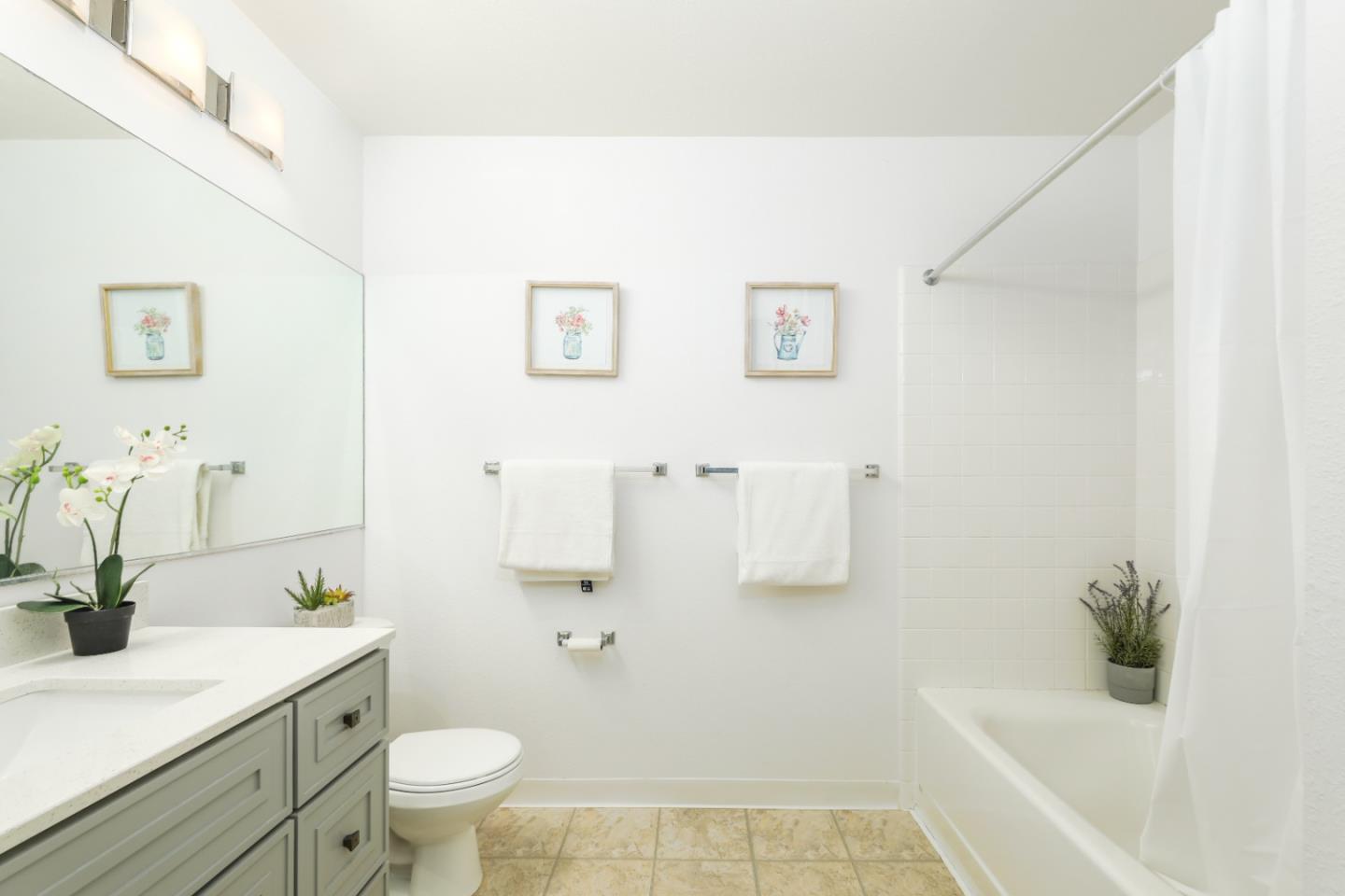 2029 Channing Way, Unit 3C Berkeley, CA 94704 - Photo 18 of 31 a bathroom with a sink toilet and shower