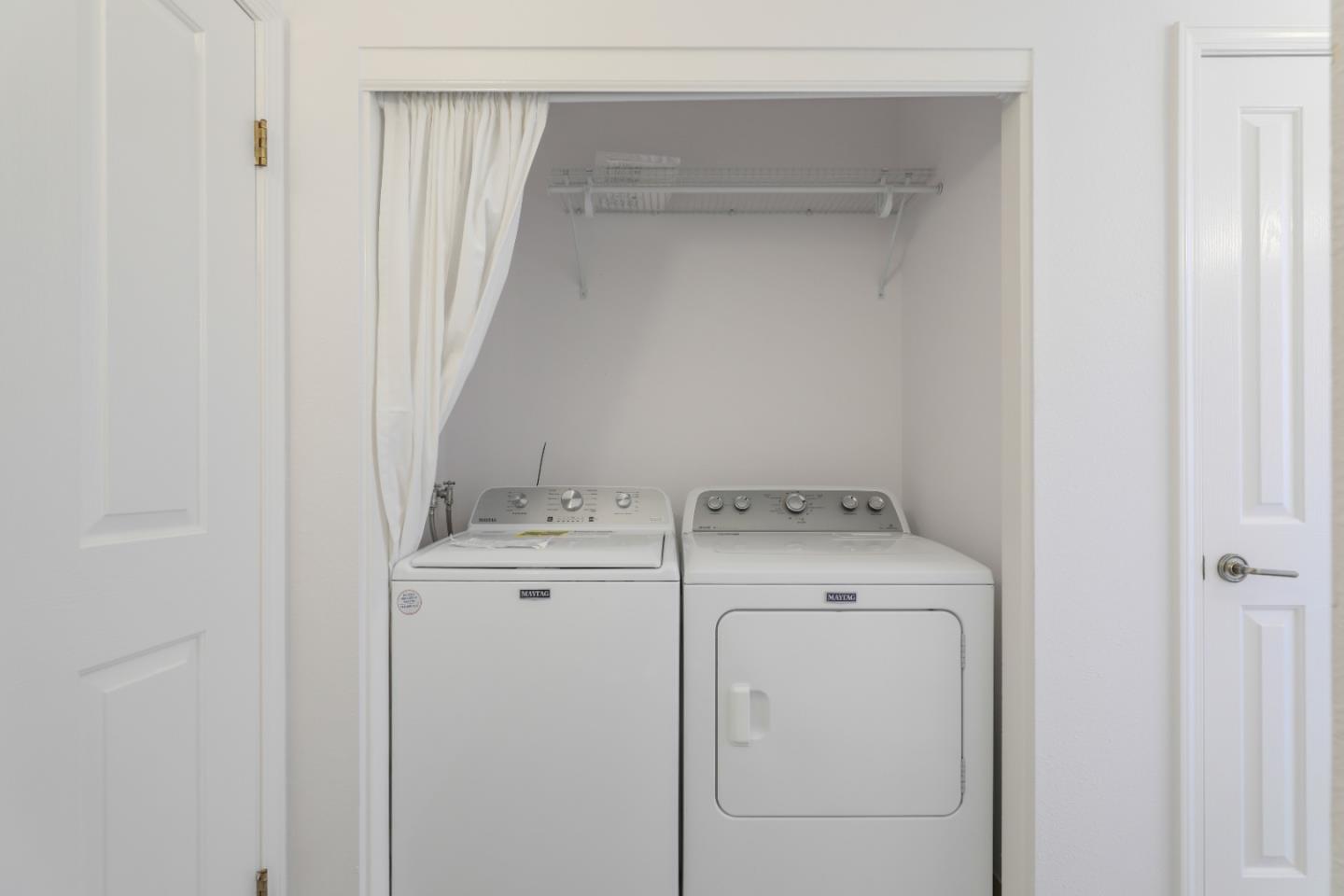 2029 Channing Way, Unit 3C Berkeley, CA 94704 - Photo 20 of 31 a utility room with dryer and washer