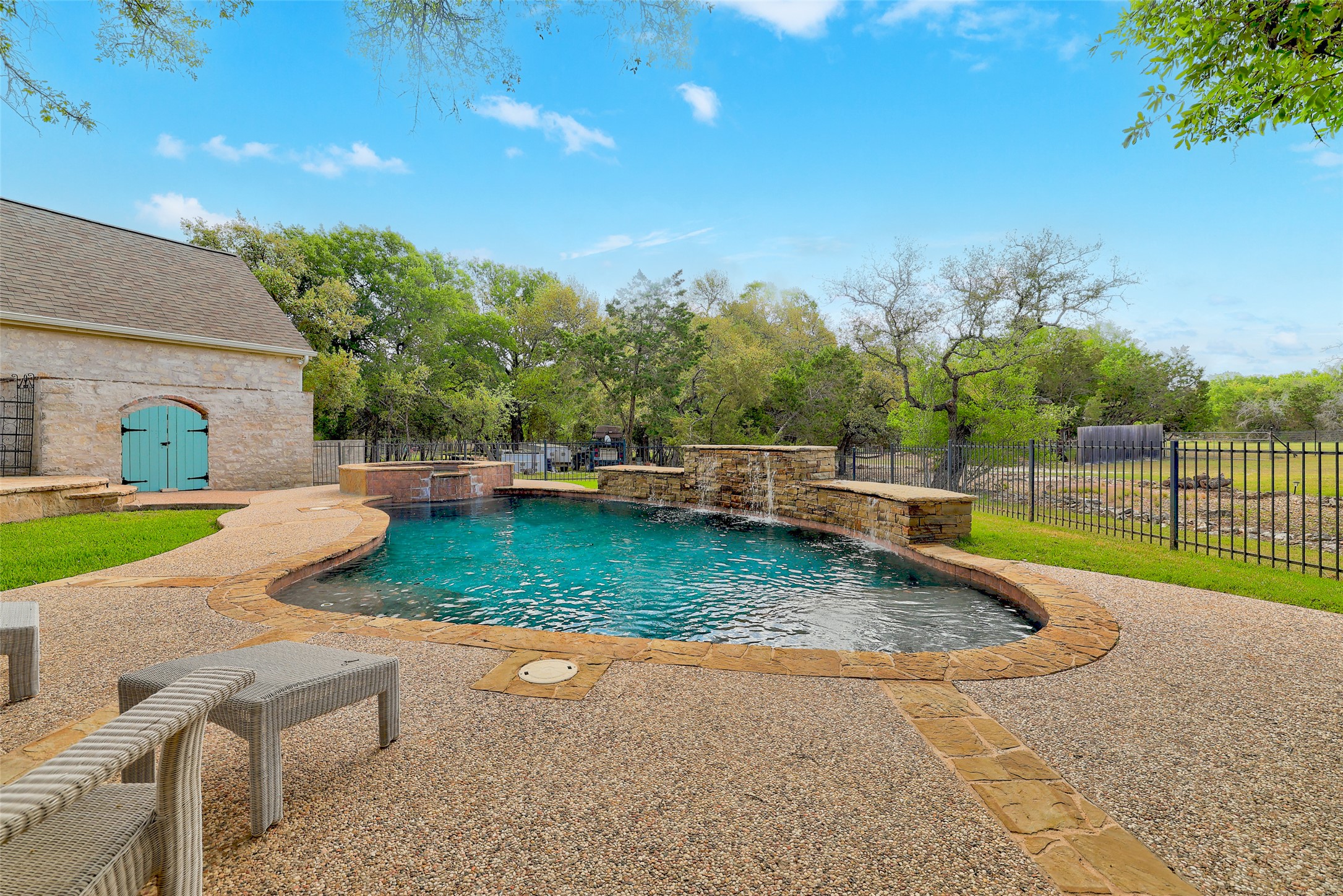 426 Logan Ranch Road Georgetown, TX 78628 - Photo 31 of 40 The view goes beyond the wrough iron fence line.