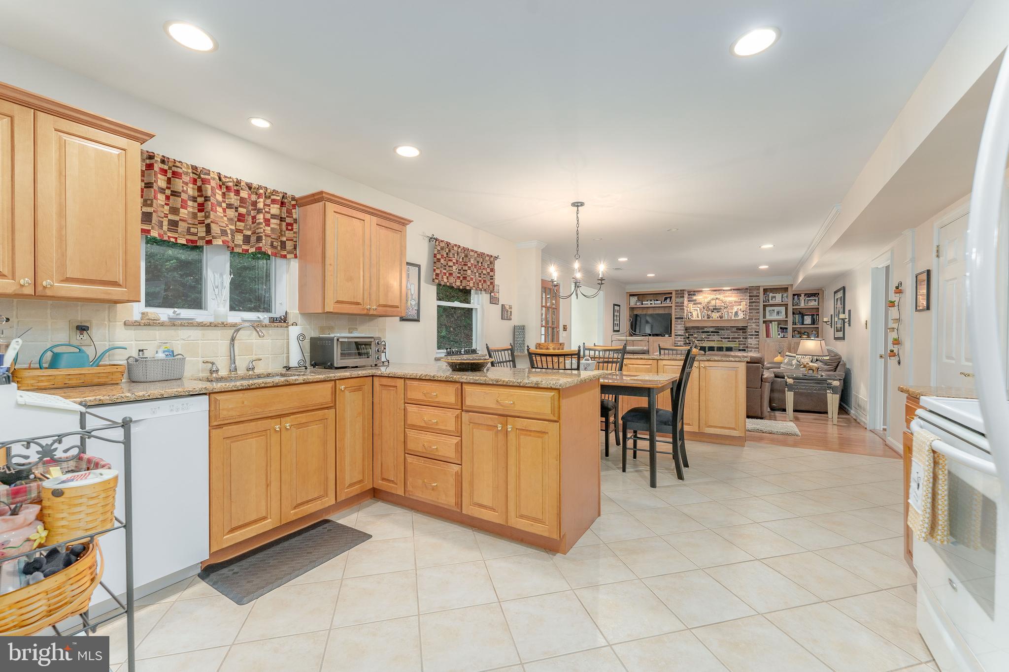345 Ellis Road Havertown, PA 19083 - Photo 15 of 47 a kitchen with cabinets and chairs