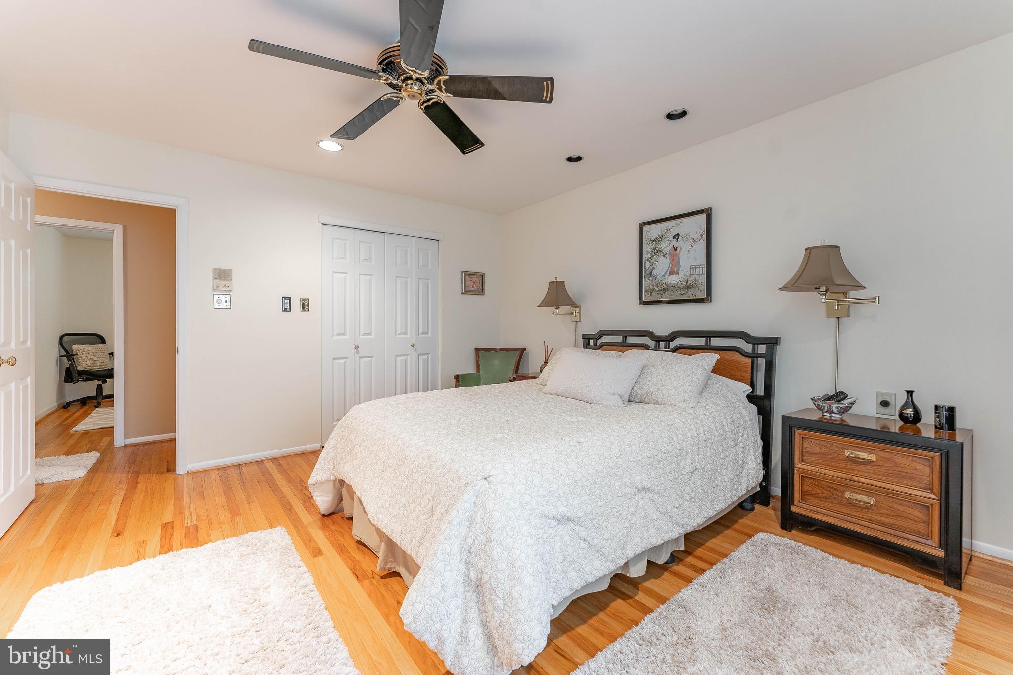 345 Ellis Road Havertown, PA 19083 - Photo 33 of 47 a spacious bedroom with a bed and a chandelier