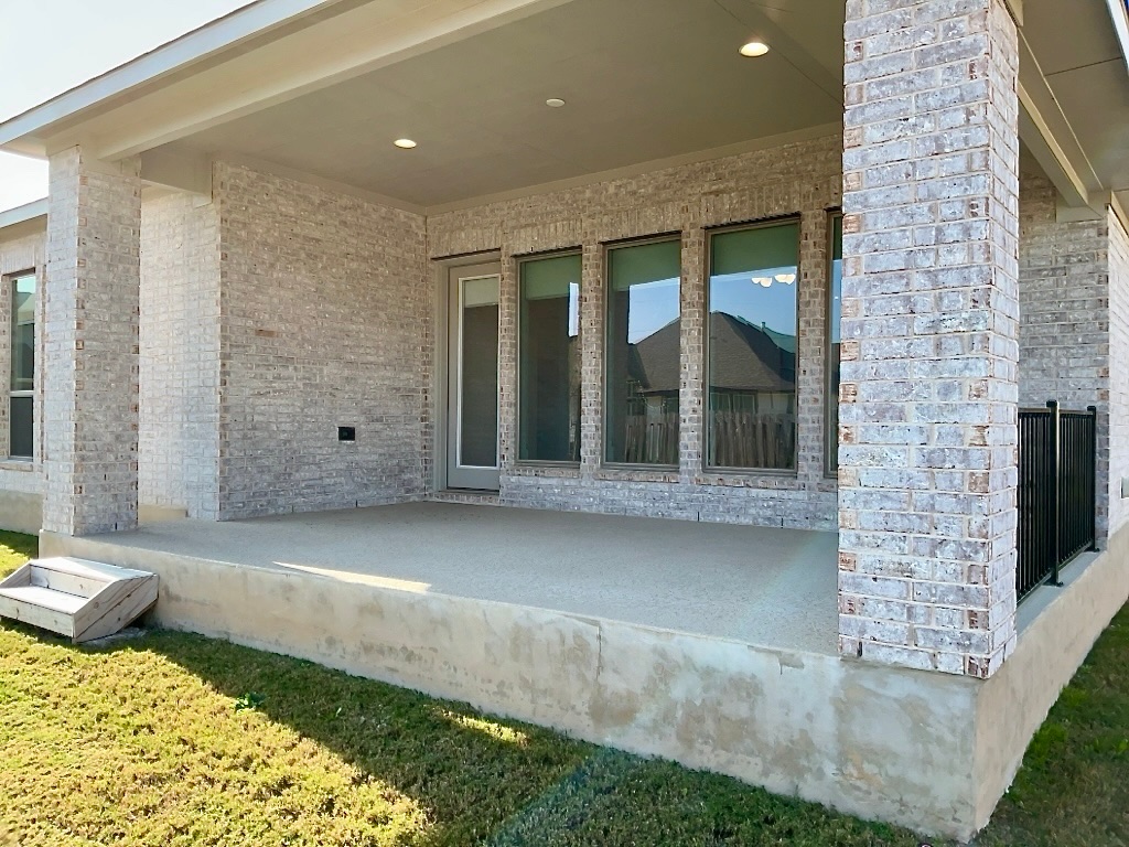 1636 Laverne Mitchell Street Leander, TX 78641 - Photo 19 of 20 Covered patio off the living room.