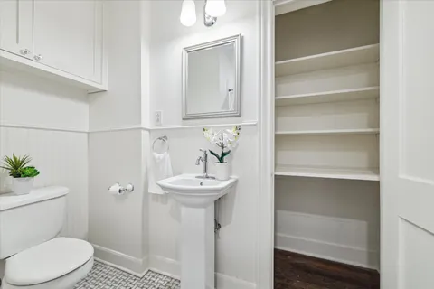 a bathroom with a toilet a sink and a bathtub