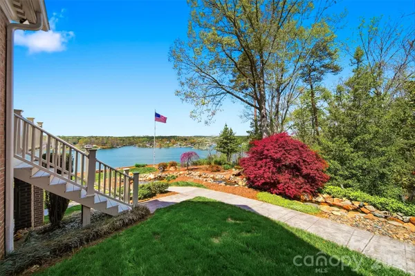 a view of a lake from a balcony