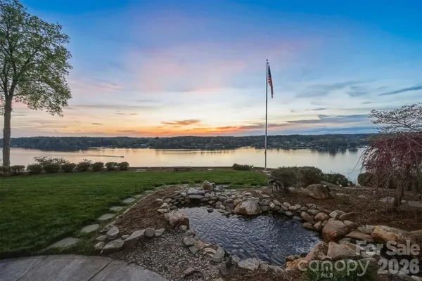 a view of a garden with a lake