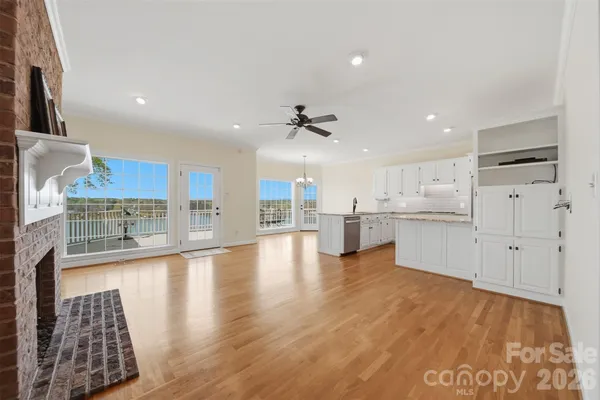 a view of kitchen with wooden floor