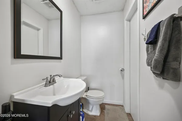 a bathroom with a sink and a toilet