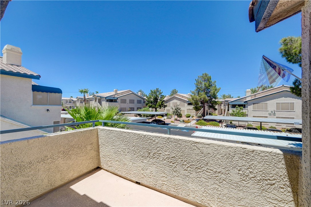 3425 East Russell Road, Unit 223 Las Vegas, NV 89120 - Photo 36 of 47 Enjoy views of the community from this well-appointed balcony, perfect for outdoor relaxation.
