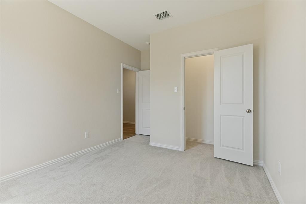 1237 Almond Road Azle, TX 76020 - Photo 17 of 24 a view of an empty room