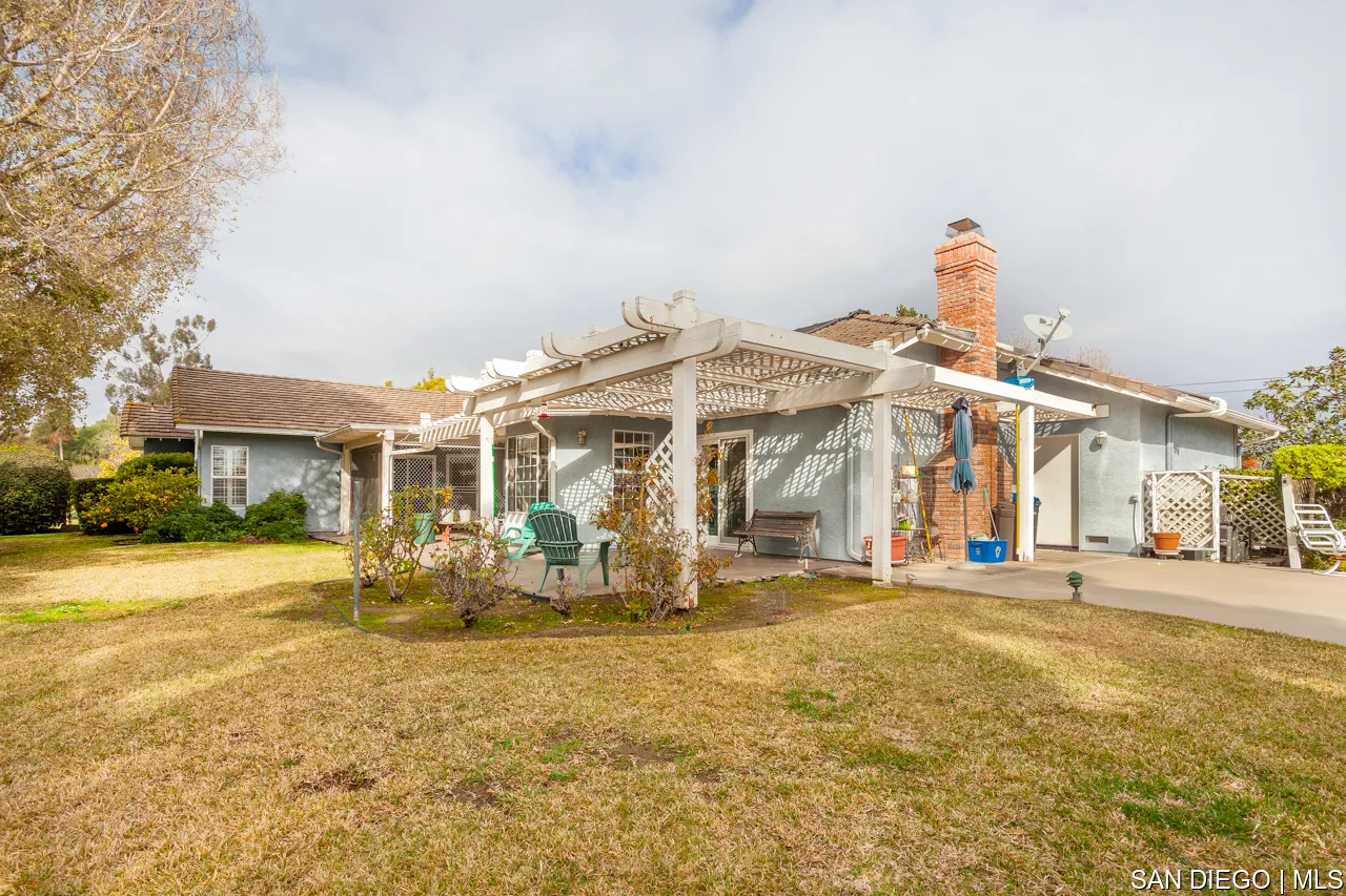 619 Elm Tree Lane Fallbrook, CA 92028 - Photo 15 of 28 a view of a building with a backyard