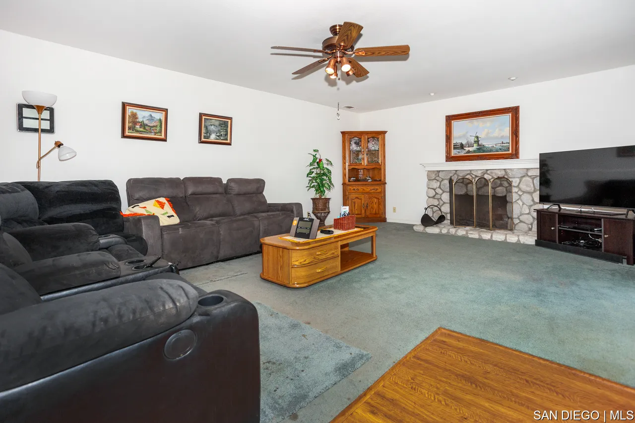 619 Elm Tree Lane Fallbrook, CA 92028 - Photo 6 of 28 a living room with furniture and a flat screen tv