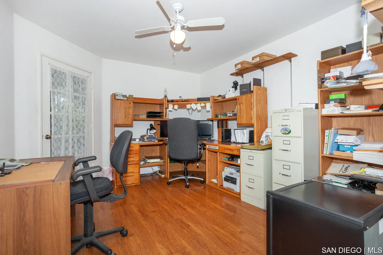 619 Elm Tree Lane Fallbrook, CA 92028 - Photo 8 of 28 a view of a workspace with furniture and a window