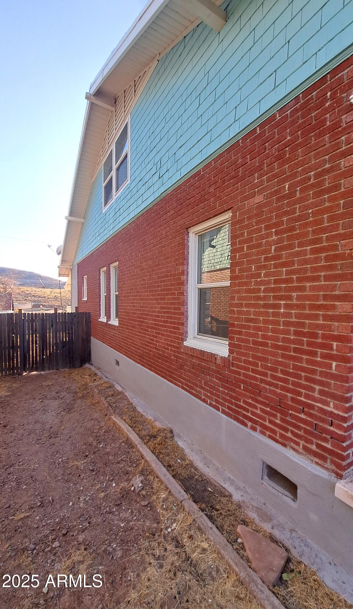 507 Bisbee Road Bisbee, AZ 85603 - Photo 23 of 26 a view of a backyard of a house