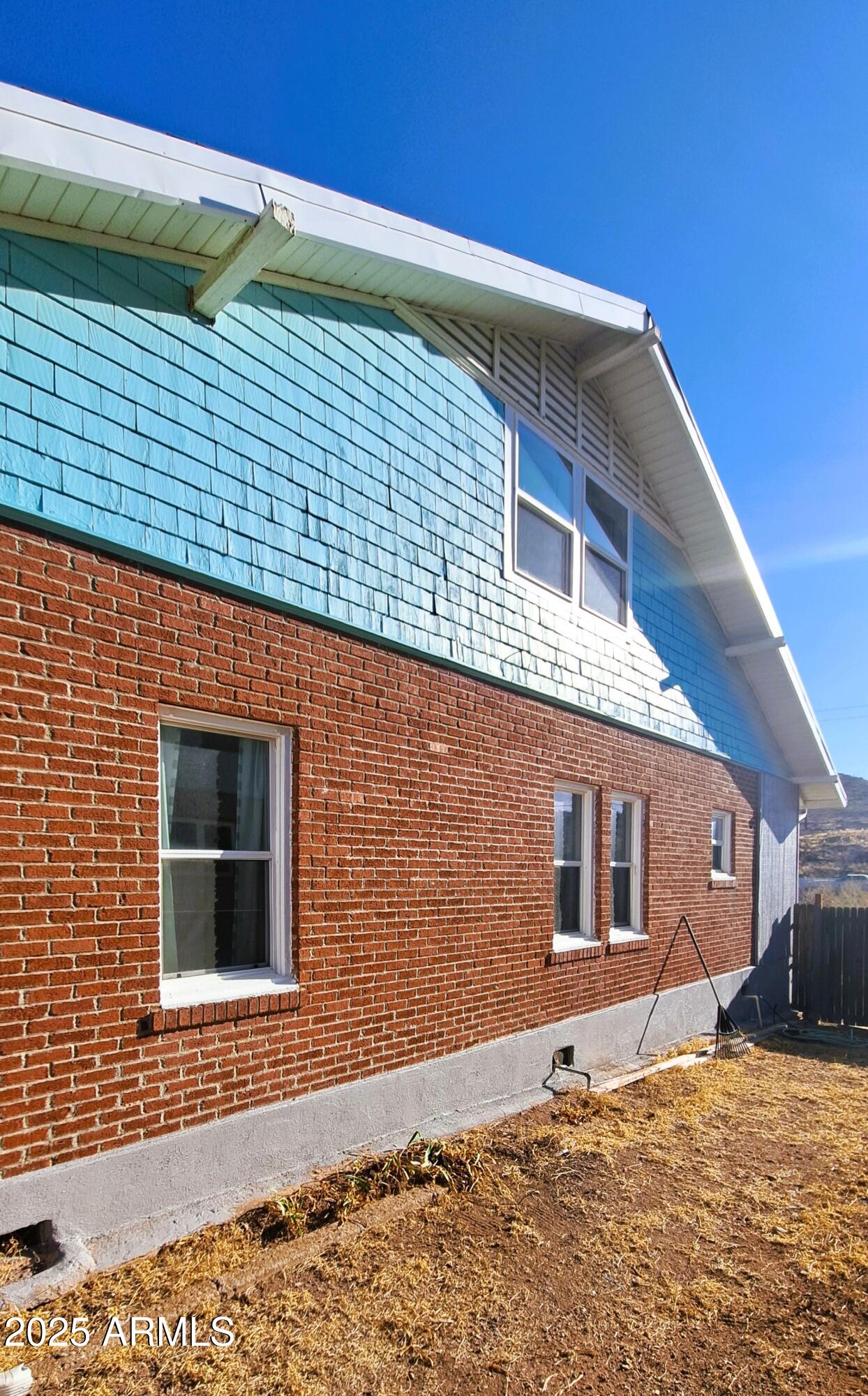 507 Bisbee Road Bisbee, AZ 85603 - Photo 24 of 26 a view of a backyard of the house