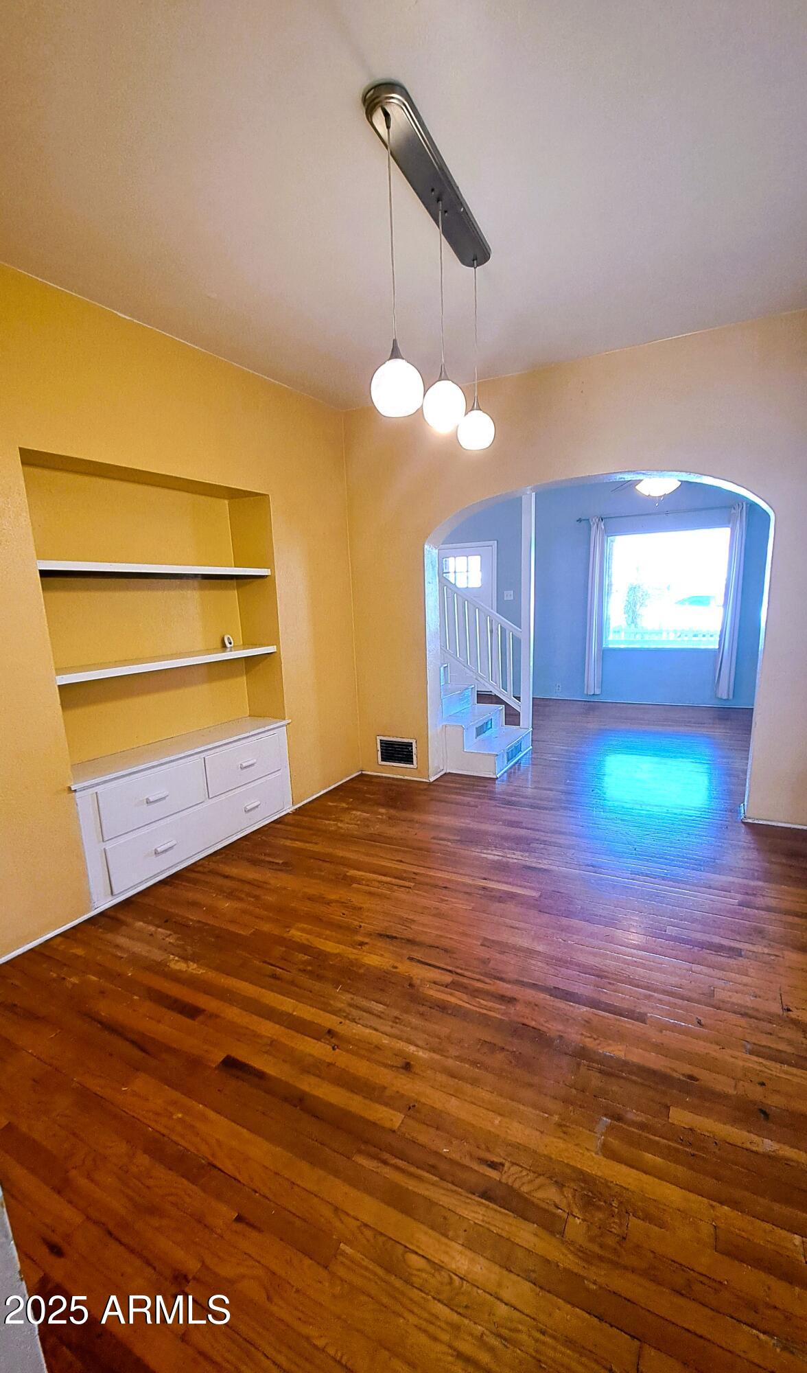 507 Bisbee Road Bisbee, AZ 85603 - Photo 5 of 26 a view of a room with a flat screen tv