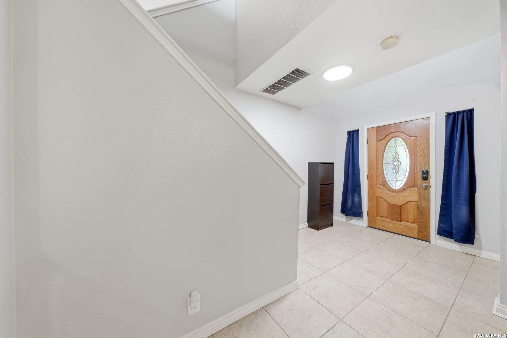 11622 Shotgun Way Helotes, TX 78023 - Photo 19 of 35 a view of a storage & utility room with washer and dryer