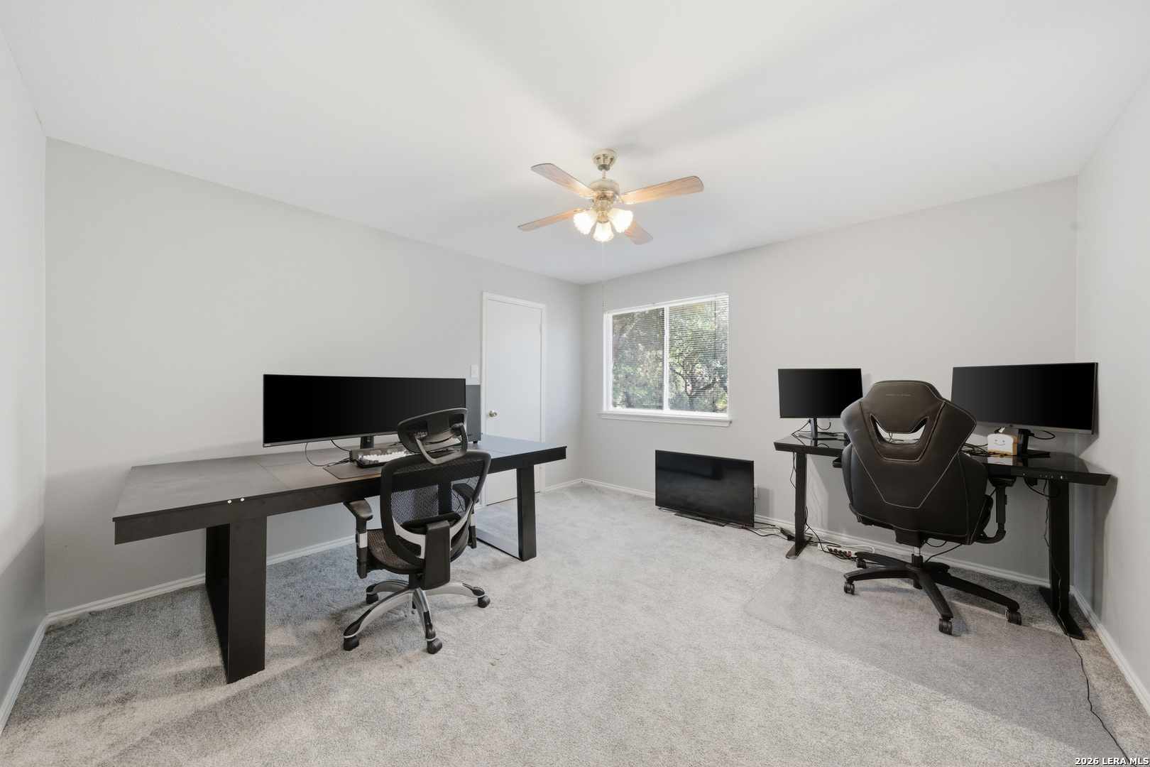 11622 Shotgun Way Helotes, TX 78023 - Photo 31 of 35 a view of a workspace with a window