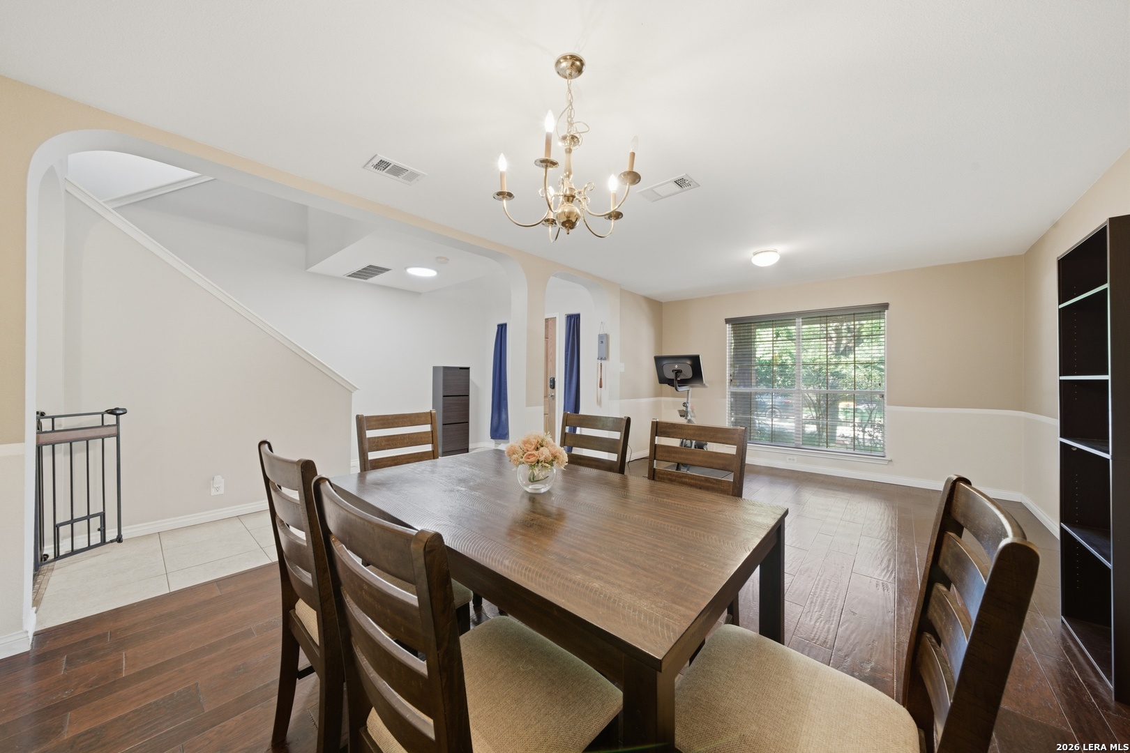 11622 Shotgun Way Helotes, TX 78023 - Photo 5 of 35 a view of a dining room with furniture and wooden floor