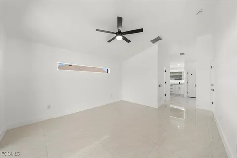 a bathroom with a granite countertop sink mirror and double