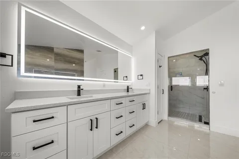 a bathroom with a bathtub sink and toilet