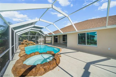 a view of yard with patio