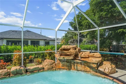 a view of a chairs and table in the patio