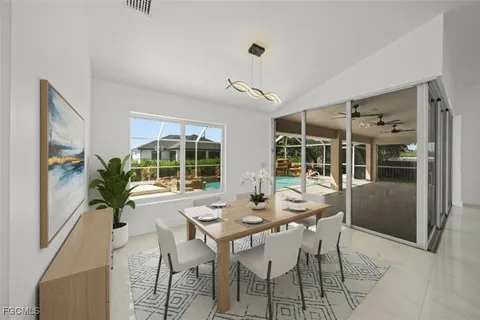 a view of a livingroom with a ceiling fan and window