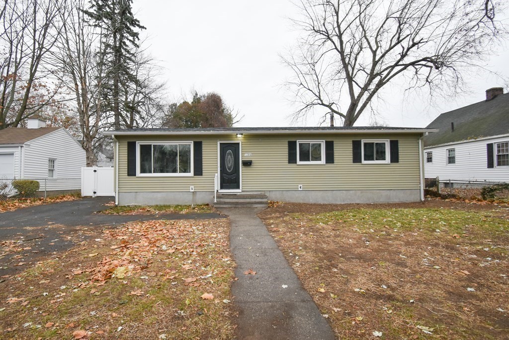 1094 Sumner Avenue Springfield, MA 01118 - Photo 23 of 35 a house with trees in the background