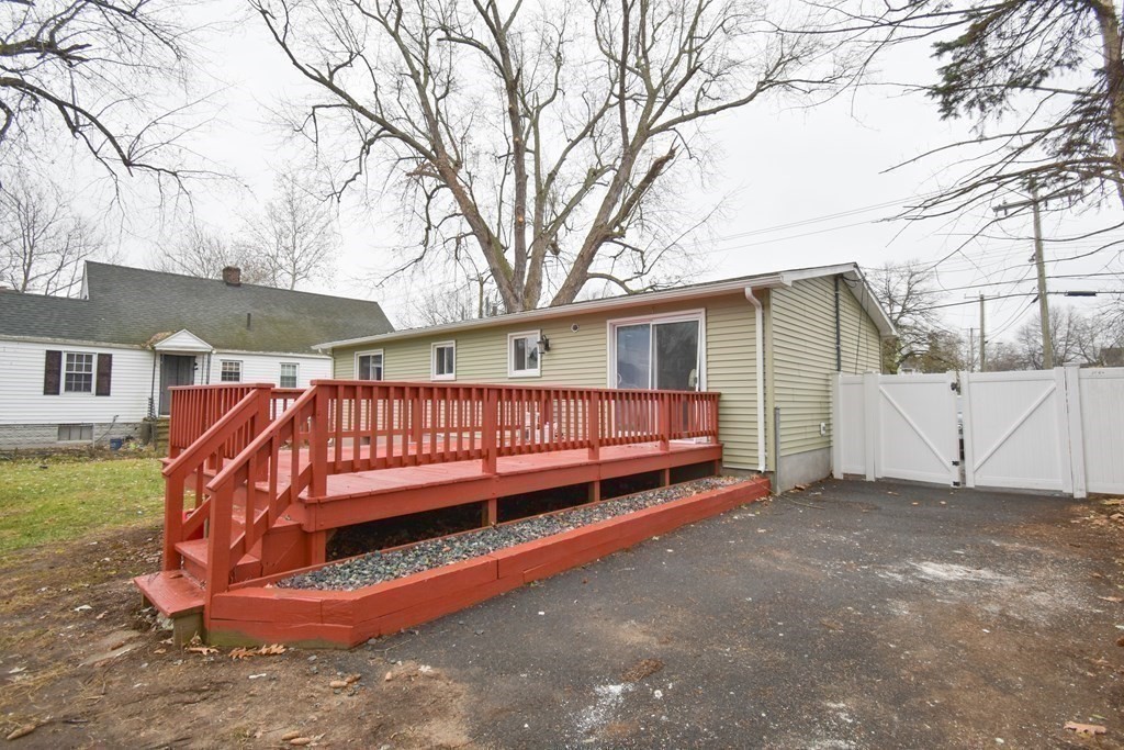 1094 Sumner Avenue Springfield, MA 01118 - Photo 28 of 35 a view of a house with a yard patio and backyard