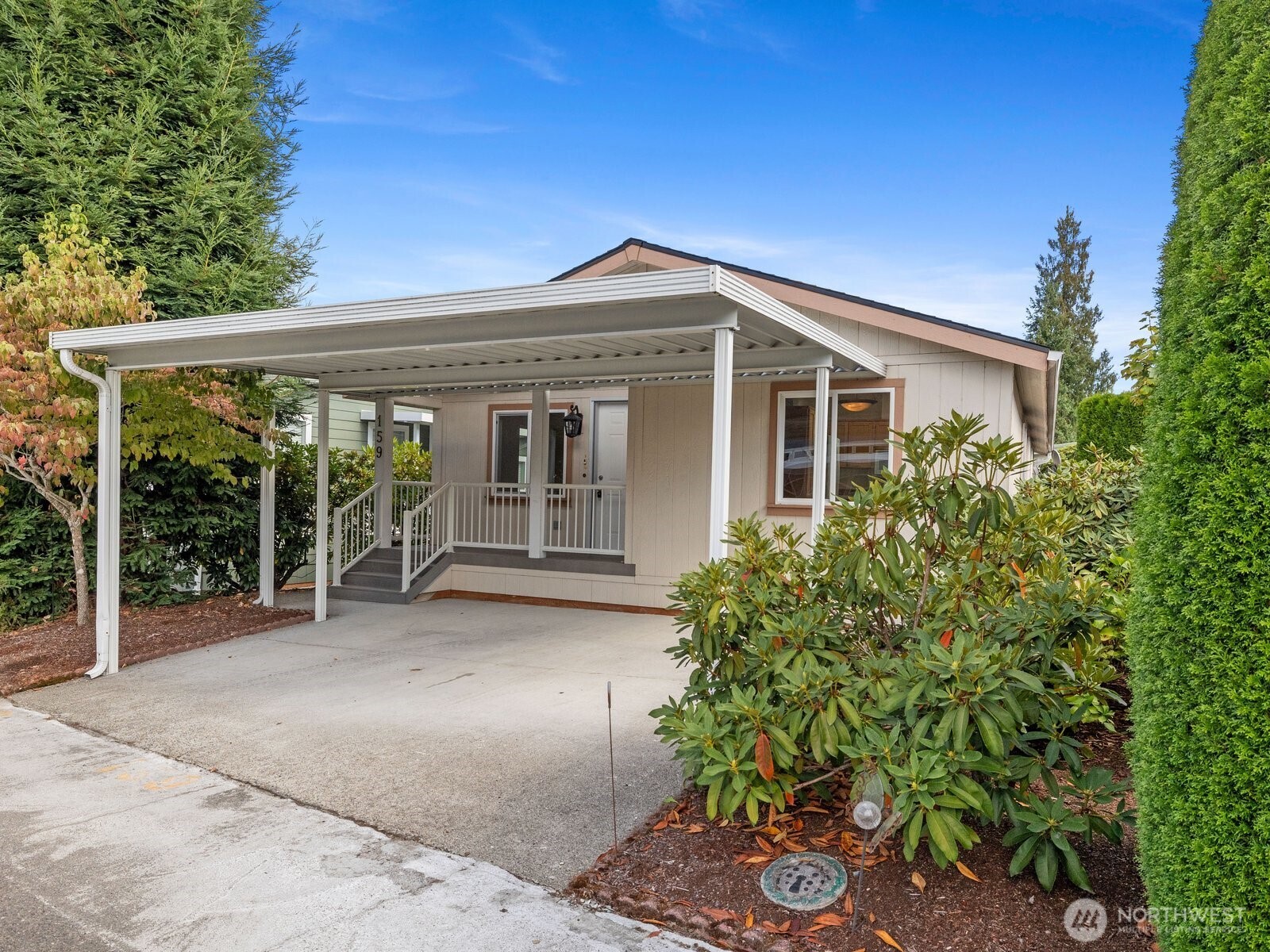 23825 15th Avenue Southeast, Unit 159 Bothell, WA 98021 - Photo 1 of 20 a view of a house with a garden