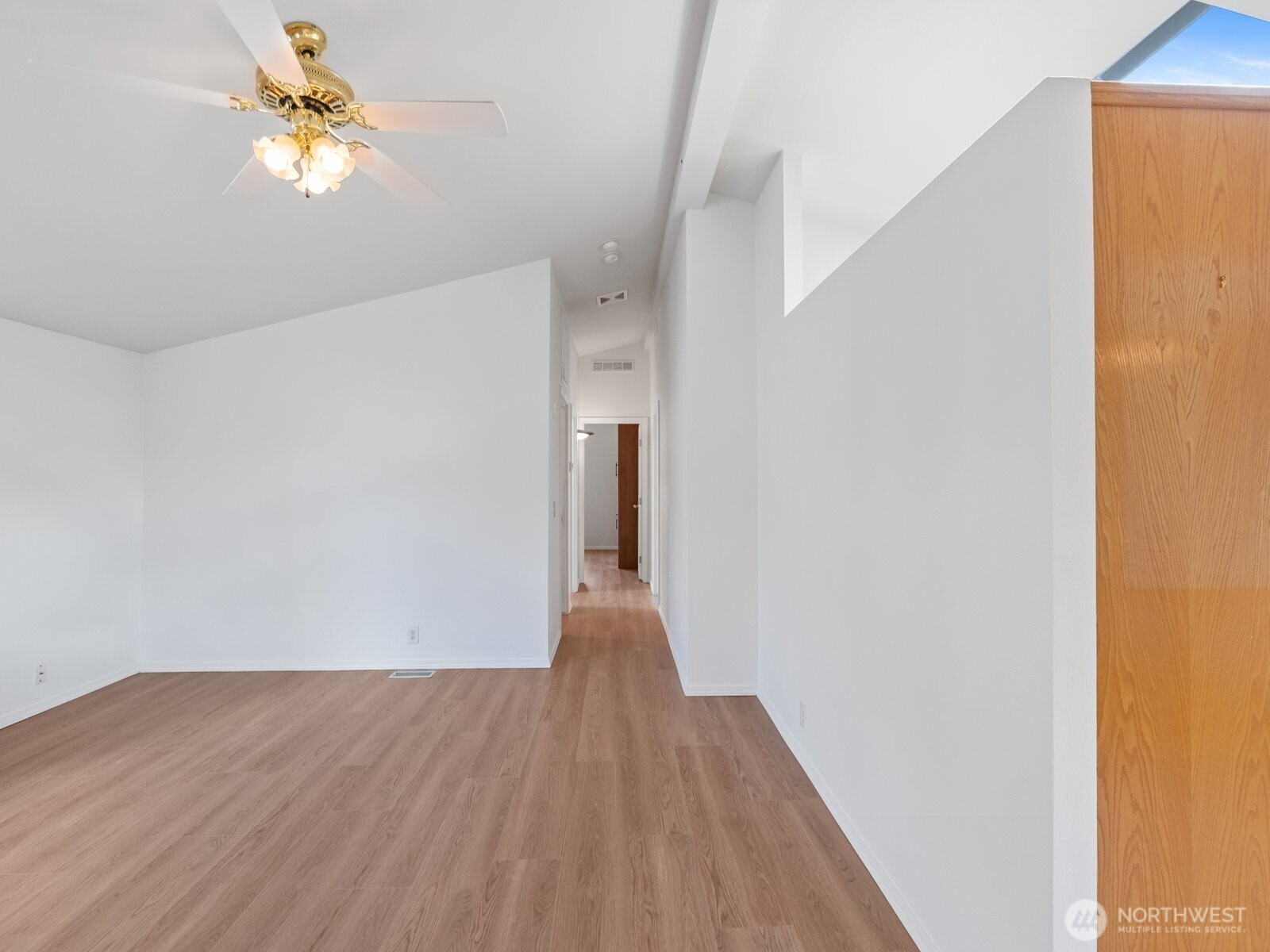 23825 15th Avenue Southeast, Unit 159 Bothell, WA 98021 - Photo 8 of 20 a view of empty room with wooden floor