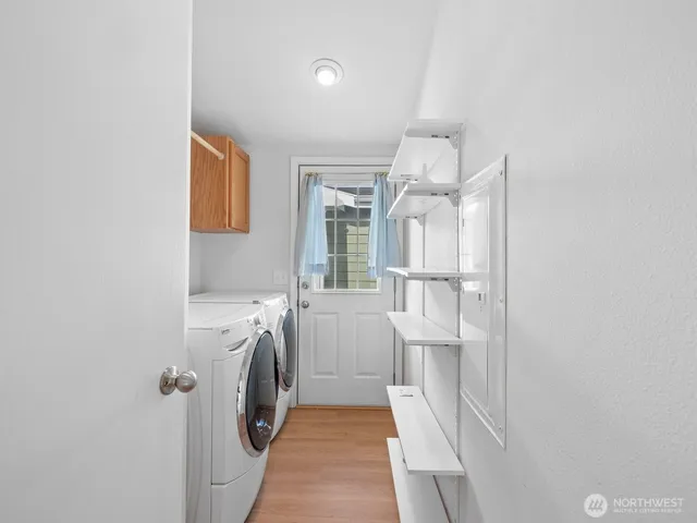 a bathroom with a sink and mirror