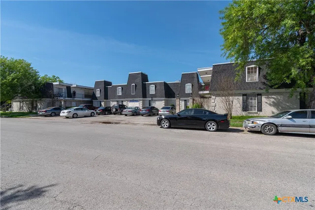a car parked in front of a house
