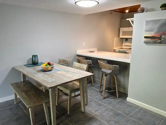 a utility room with a sink a washer and dryer
