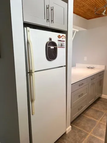 a kitchen with stainless steel appliances granite countertop a sink and a stove