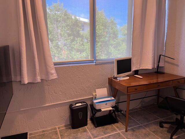 87465 Old Highway, Unit 224 Islamorada, FL 33036 - Photo 22 of 39 a room with a desk and a window