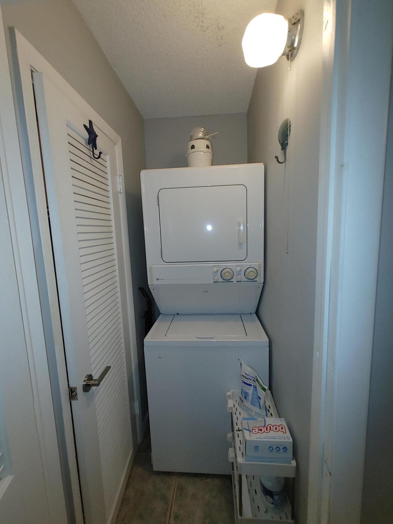87465 Old Highway, Unit 224 Islamorada, FL 33036 - Photo 28 of 39 a utility room with dryer and washer