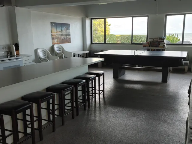 a view of a balcony with chairs