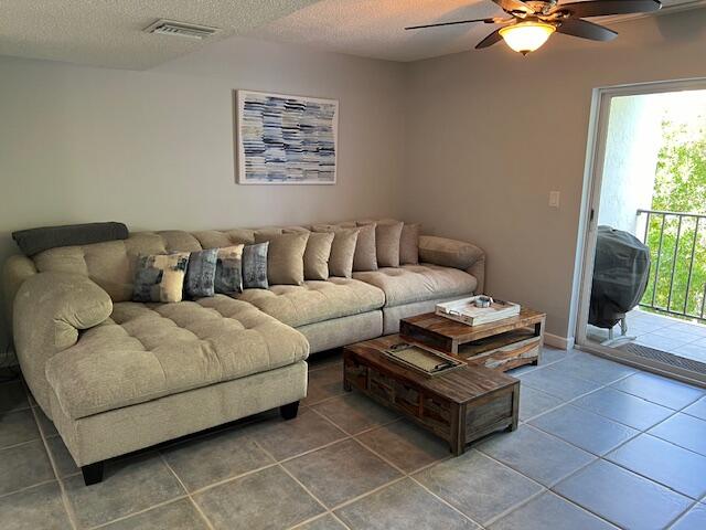 87465 Old Highway, Unit 224 Islamorada, FL 33036 - Photo 7 of 39 a living room with furniture and a window