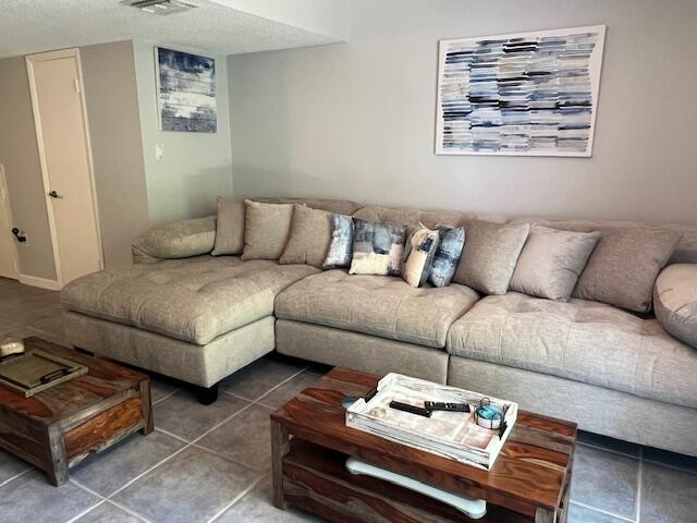 87465 Old Highway, Unit 224 Islamorada, FL 33036 - Photo 8 of 39 a living room with furniture and white walls