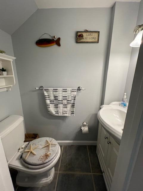 87465 Old Highway, Unit 224 Islamorada, FL 33036 - Photo 10 of 39 a bathroom with a sink toilet and a mirror