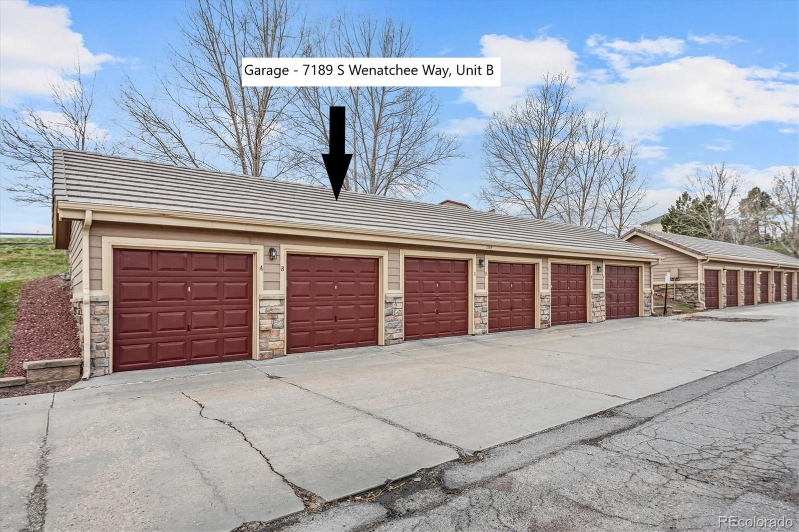 22960 East Roxbury Drive, Unit F Aurora, CO 80016 - Photo 24 of 43 a view of a house with a garage