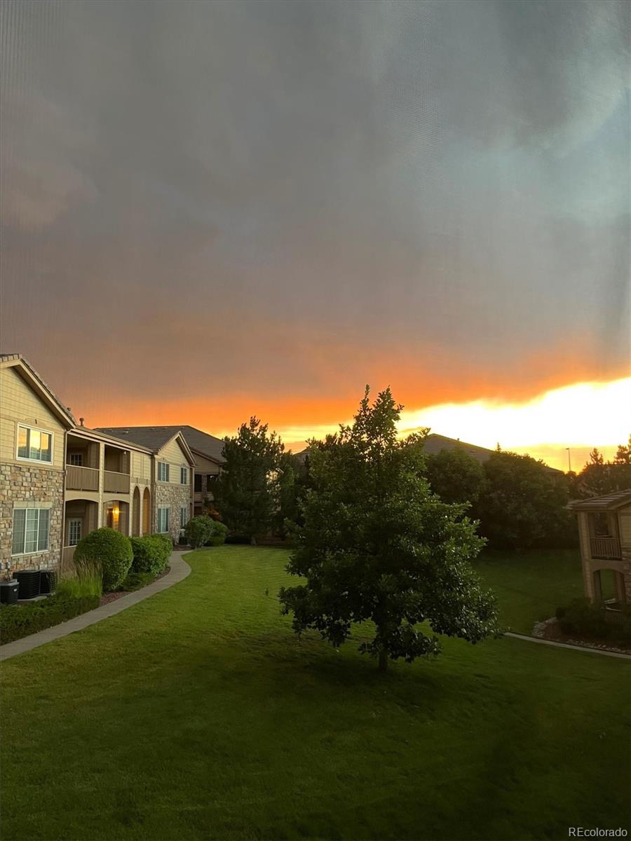 22960 East Roxbury Drive, Unit F Aurora, CO 80016 - Photo 33 of 43 a view of a house with a big yard