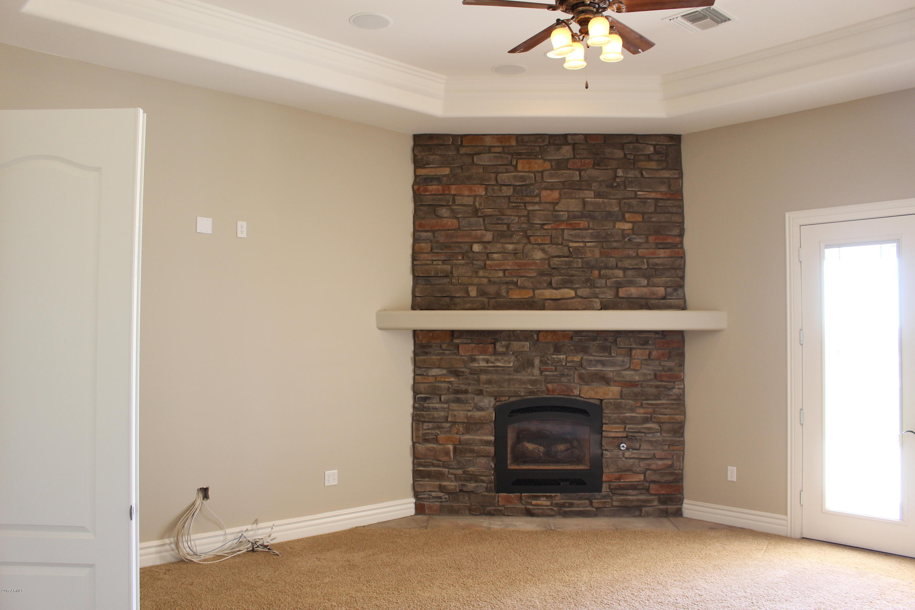 29981 West Marsh Road Casa Grande, AZ 85193 - Photo 12 of 38 Master bedroom fireplace